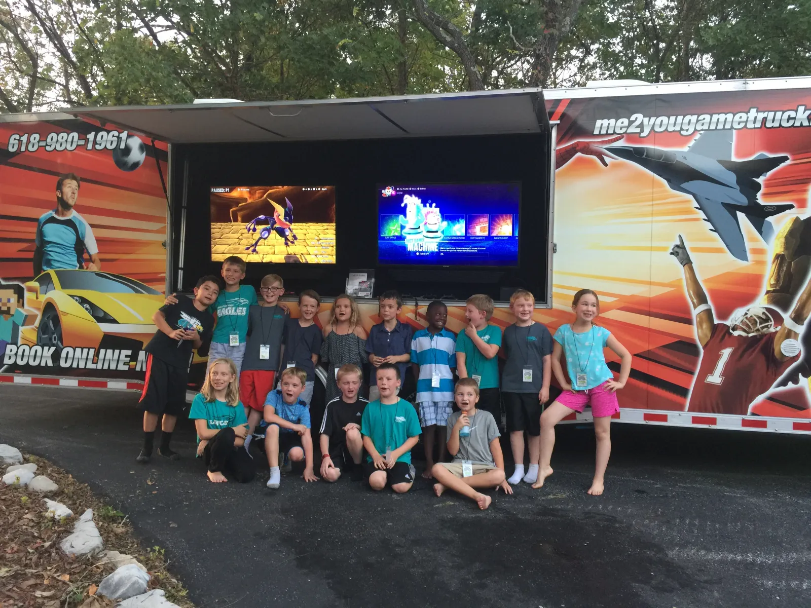Kids celebrating a birthday party at the Me 2 You Game Truck