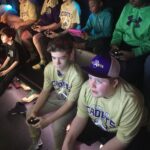 Students having fun at schools game truck