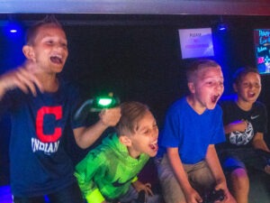 Kids cheering at Me 2 You Game Truck